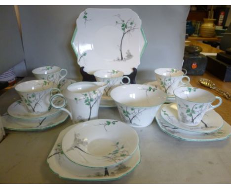 Shelley Ideal china teaware, (pattern no.WS058-15), decorated in monochrome and highlighted in emerald green with trees in a 