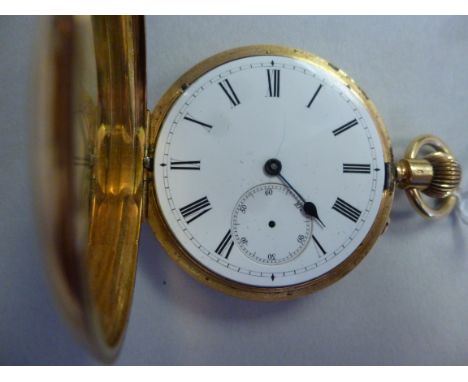 An 18ct gold cased full hunter pocket watch, the keyless movement faced by a white enamel Roman dial with subsidiary seconds