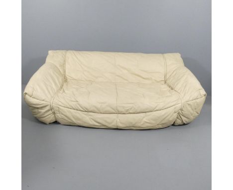 ROCHE BOBOIS - a 1980s Informel sofa designed by Hans Kopfer, in cream leather, with fold-out bed mechanism. Maker's marks to