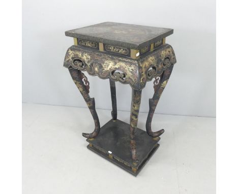 An oriental black lacquered lamp table, with painted dragon decoration and raised on pedestal base. 51x86x40cm. 