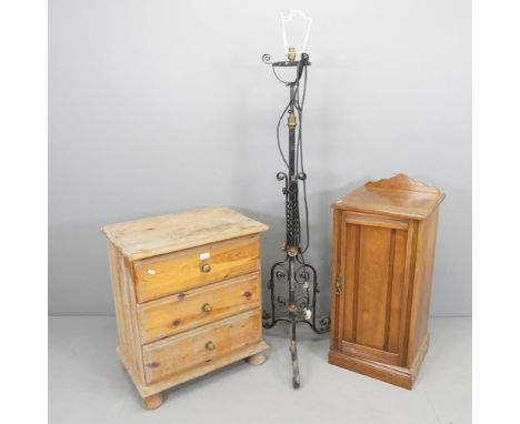 A wrought iron black painted telescopic standard lamp. H - 140cm.