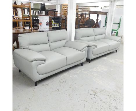 A contemporary grey faux-leather upholstered three-seater sofa, 195x90x86cm, and a smaller matching two-seater sofa, 163x90x8