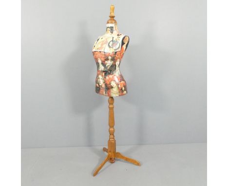 CLIVE FREDRIKSSON - a decoupage decorated mannequin of the female form on pine tripod stand, height 163cm 
