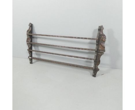 An antique carved oak two-tier hanging shelf. 125x67x17cm. 