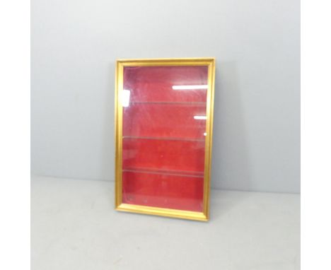 A gilt-painted hanging display cabinet, with three glass shelves. 52x83x13cmGenerally good condition. Lining requires some at