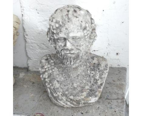 A weathered composite bust sculpture, study of Bacchus. 38x52x25cm.