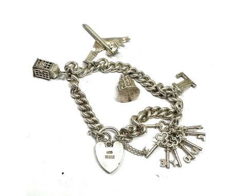Vintage silver charm bracelet weight 33g 