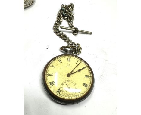 Antique gun metal open face Omega pocket watch and chain the watch is ticking comes with 