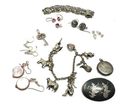 selection of vintage silver jewellery inc charm bracelet coin bracelet earrings etc weight 65g 