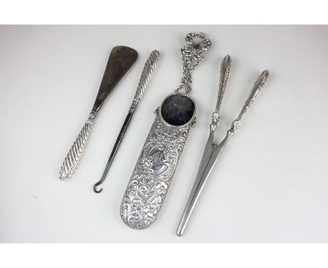 An Edward VII silver lady's spectacles case embossed scroll decoration with engraved initials and date 1901, with belt clip a