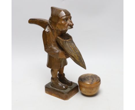 A Black Forest figural nut cracker and a Chinese box and carved cover, 30cm