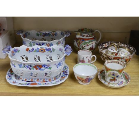 A pair of English ‘Japan Opaque’ china chestnut baskets and stands, c.1825, a Worcester 'dragons in compartments' saucer, Liv