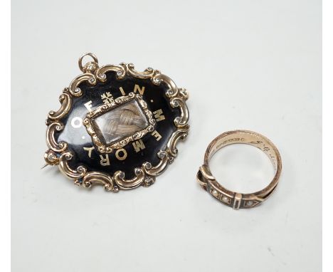 A Victorian 9ct gold, black enamel, plaited hair and seed pearl set mourning buckle ring, size P and a similar yellow metal b