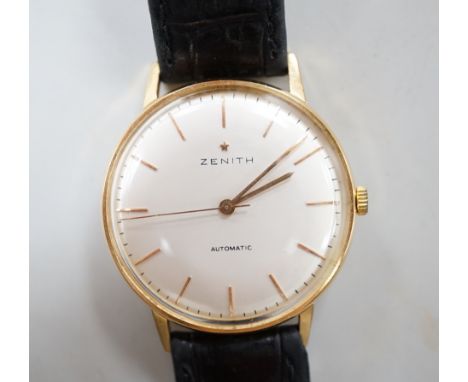 A gentleman's yellow metal (Swiss 750 mark) Zenith automatic wrist watch, with baton numerals, on associated leather strap, n