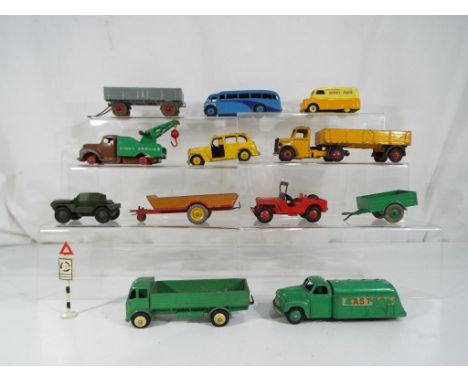 Dinky Toys - Twelve unboxed Dinky diecast model motor vehicles to include # 25Y Jeep, # 254 Austin Taxi, # 551 Trailer, # 430