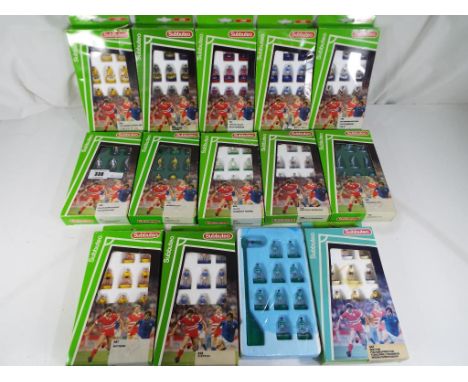 Subbuteo - Fourteen Subbuteo table football teams 63000 to include # 690 Wimbledon, # 701 Crystal Palace, # 740 Tottenham Hot