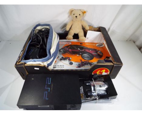 A good mixed lot to include Playstation 2 with controllers, power cable, a pair of 5 x 30 digital camera binoculars, a Meccan