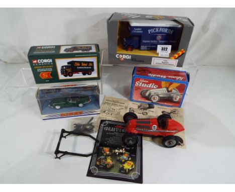 A Schuco tin plate studio Rennwagen - Monteur car with key, nuts, bolts and tools, manual and box. Also included in the lot i