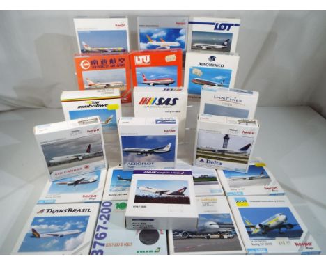 Herpa - Twenty One diecast model airplanes in 1:500 scale, predominantly by Herpa, all boxed. - This lot MUST be paid for and