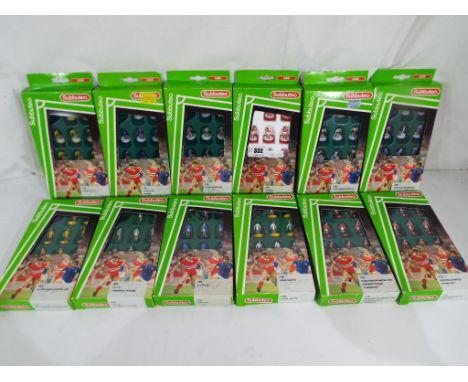 Subbuteo - Twelve Subbuteo table football teams 63000 to include # 749 Wimbledon, # 774 Arsenal, # 779 Leeds United 2nd Team,