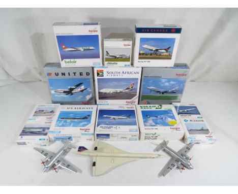 Herpa - Thirteen diecast model aeroplanes, all boxed, by Herpa in 1:500 scale. Two diecast Viking aeroplanes by Dinky Toys G 