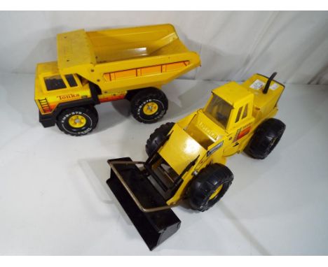 Tonka - Two good quality Tonka trucks XMB - 975 to include a tipper 70 - 001 and a Turbo Diesel Tractor 70 - 004 (2) - This l