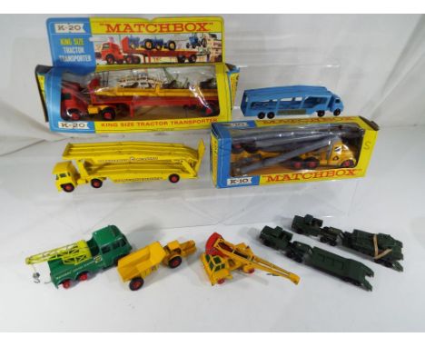 Matchbox by Lesney - three boxed metal diecast models comprising Pipe Truck K-10, Tractor Transporter K-20 and seven further 