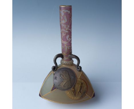 An extraordinary example of Mt. Washington's Royal Flemish glass, this vase features a unique triangular form with intricate 