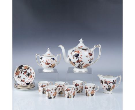 A beautifully crafted 15-piece Coalport bone china tea set in the "Hong Kong" pattern, featuring intricate floral designs and