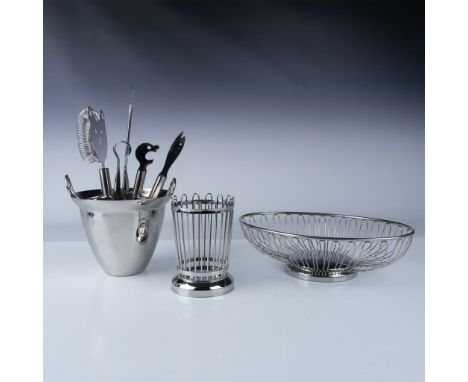 This collection features premium stainless steel tableware pieces, including a WMF Gourmet Line waste bin, a WMF wire bread b