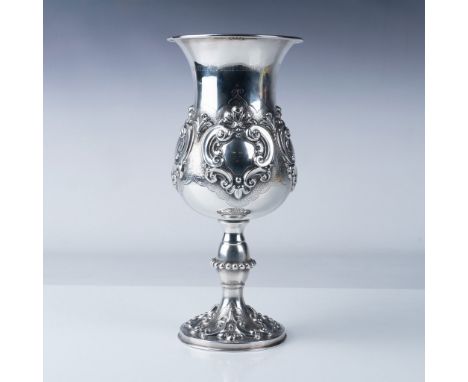 A stunning sterling silver Kiddush cup, standing 12 inches tall, crafted by renowned silversmiths Topazio and Grand. This ele