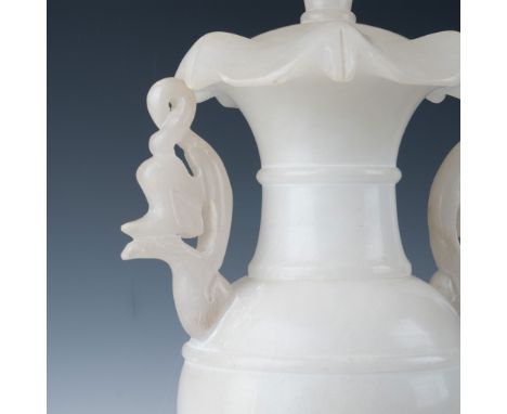A stunning vintage alabaster table lamp featuring an elegant baluster form with intricately carved handles. The piece boasts 