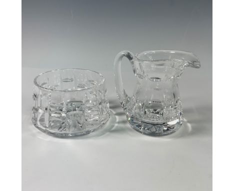 A beautifully crafted Waterford crystal creamer and sugar bowl set featuring the iconic brilliance and clarity that defines t