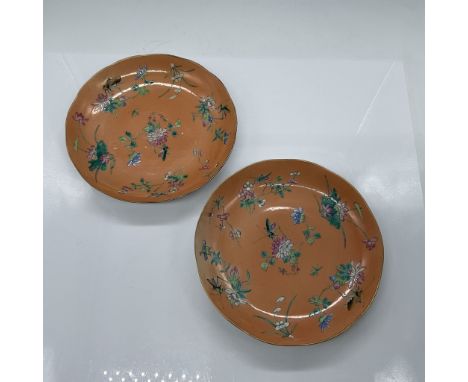 A pair of Chinese porcelain bowls from the Tongzhi Emperor's reign (1862-1874), each measuring 7" in diameter. These bowls fe
