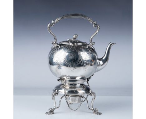 Antique silver plated kettle on stand with burner by Mappin Brothers, featuring ornate legs and a scrolled handle. The kettle