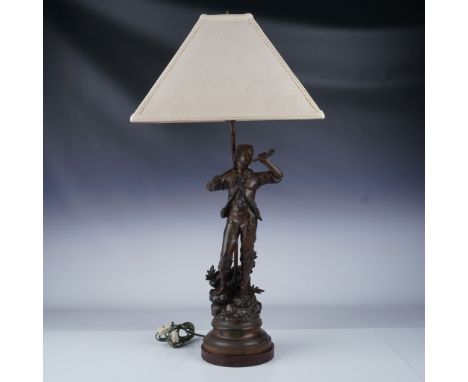 This striking table lamp features a bronze sculpture titled Le Signal by renowned French sculptor Ernest Rancoulet. Born in 1