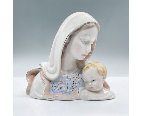 This glossy figure features Madonna and Child. She is fashioned in a white, soft pink robe and light blue shirt with gilded g