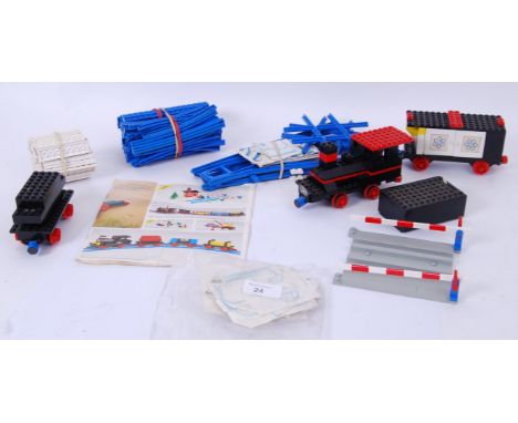 LEGO TRAIN: A collection of vintage early Lego 1970's Train set pieces and accessories to include 133 Locomotive, wagons, tra