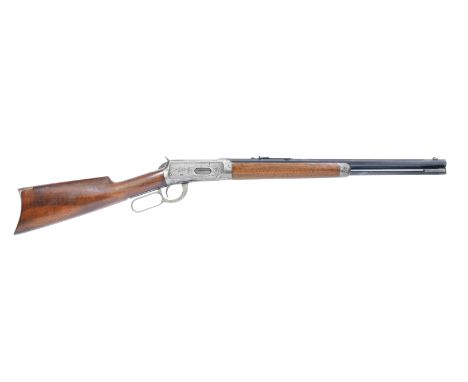 A .30 (W.C.F.) 'Model 1894' lever-action short rifle by Winchester, no. 599050The bright receiver custom engraved in the fact