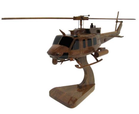 The UH-1N Twin Huey, often referred to as the Bell 212 Super Huey, is a versatile medium-lift utility helicopter manufactured