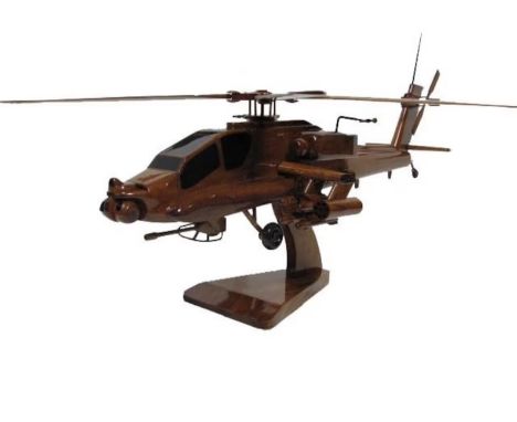 The AH-64 Apache is an iconic attack helicopter developed by McDonnell Douglas (now part of Boeing) for the United States Arm