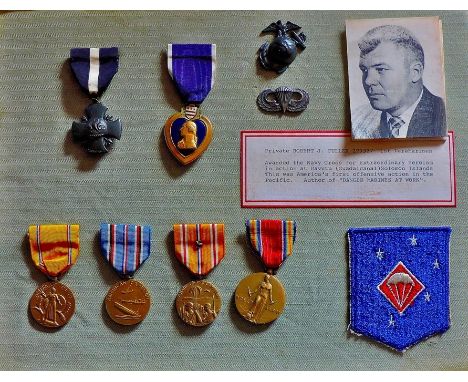 World War II U.S.M.C.  Fine group of five medals (including Navy) to Pvt. R.J.Fuller 1st Para Marines with picture and patch.