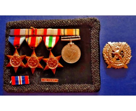 Group of Four World War II  1939-1945 Star; Africa Star; 1st Army Clasp and Numeral; Italy Star, Victory Medal.  London Scott