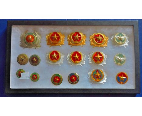 North Vietnam Cap badges - A collection of (17) including; Army, Navy, Staff officers etc. A good collection well displayed.