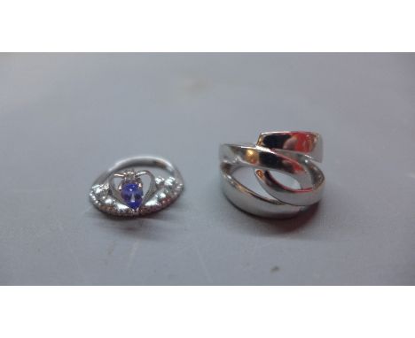 Two ladies silver rings, one marked S925 Elle inset with single ruby size 'N/O' together with a 925 silver Tiara ring Size 'M