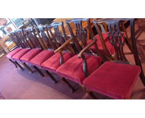 A set of eight Chippendale style mahogany dining chairs to include two carvers.
