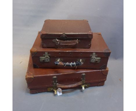 A revelation brown leather travelling trunk, together with two other smaller ones (3)