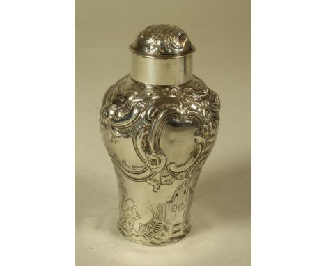 A GEORGE III SILVER TEA CADDY, maker's mark WM below an * (unknown), London 1752, of inverted baluster form, the shoulders la