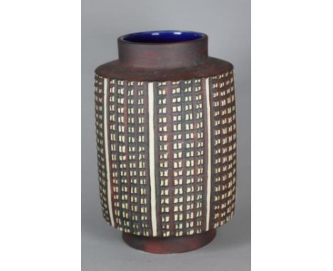 A POOLE POTTERY STUDIO VASE, 1961-63, designed by Robert Jefferson, of cylindrical form, carved with stylised linear columns 