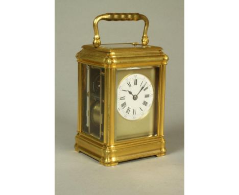A SMALL CARRIAGE CLOCK, 20th century, the twin barrel movement with platform escapement and repeater striking on a gong, whit